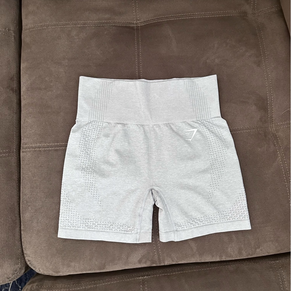 Gymshark high waist light gray biker shorts size S. Excellent condition.